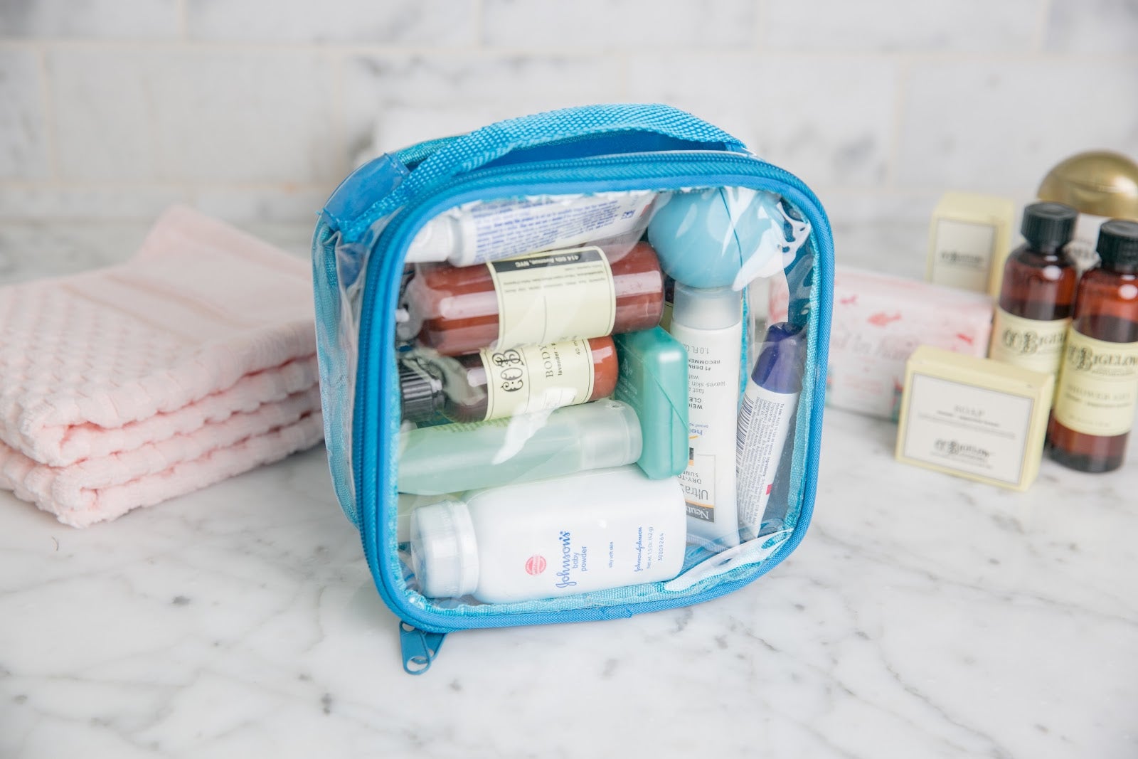 Turquoise extra small TSA approved toiletry bag from Junyuan