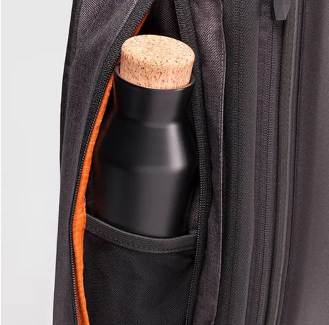 Professional backpack with hidden water bottle pocket
