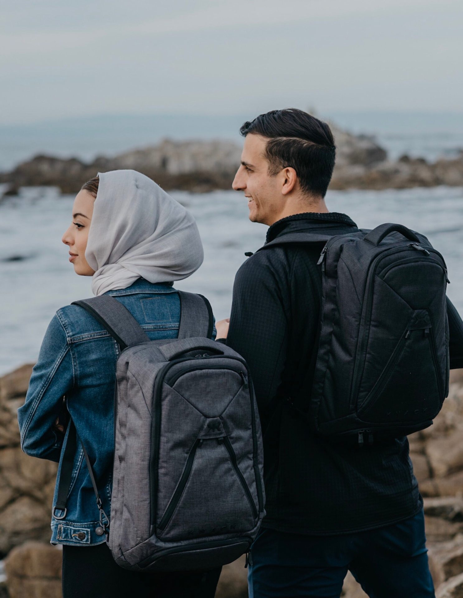 Noha Souhnoune and her husband wearing their Knack Packs while on their honeymoon