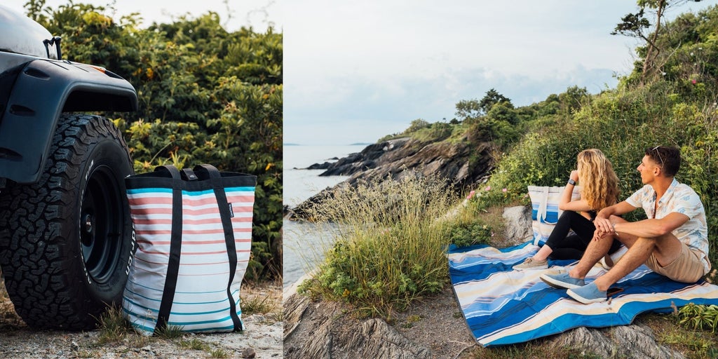 Couple sitting on outdoor blanket on cliffs