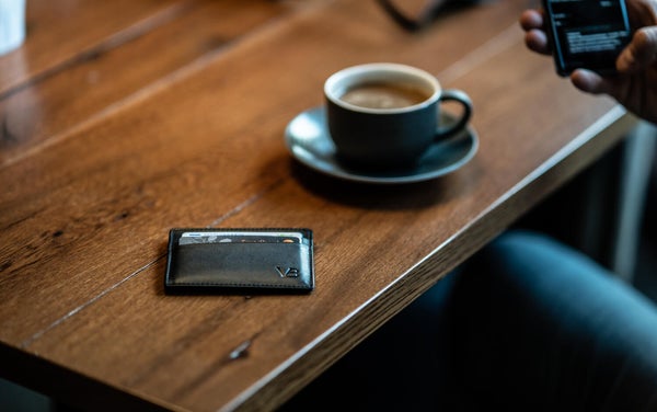 minimalist leather card holder on table