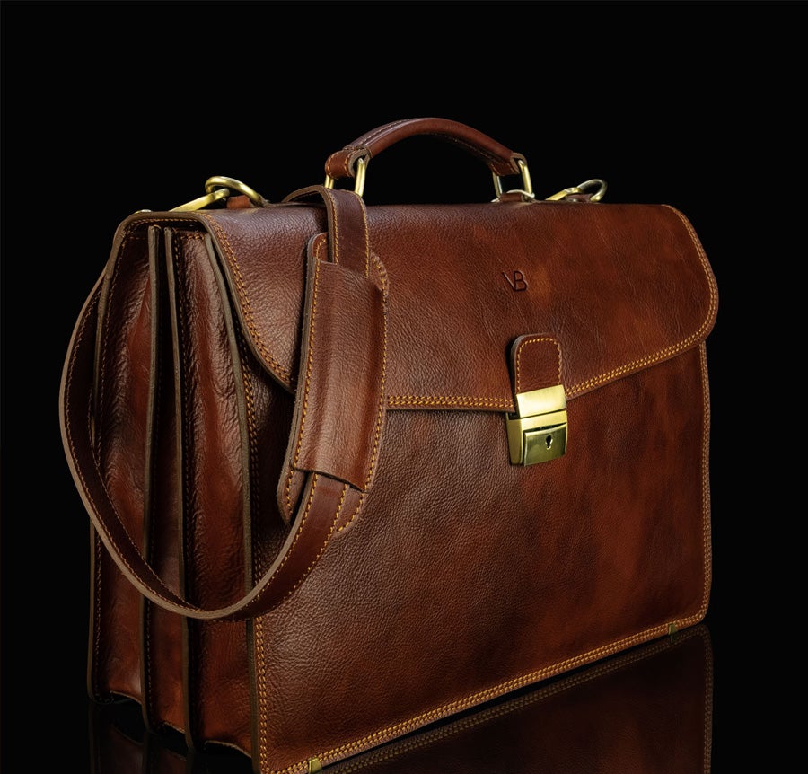 Brown leather briefcase with messenger strap