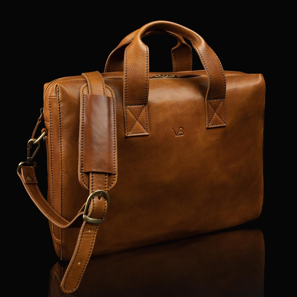 tan essential leather briefcase with shoulder strap