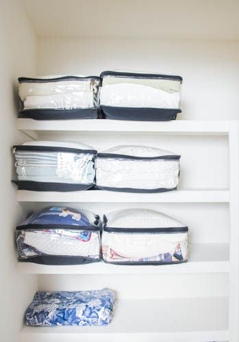 linen closet organization with packing cubes