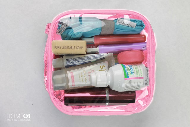 Toiletries in a pink extra small cube