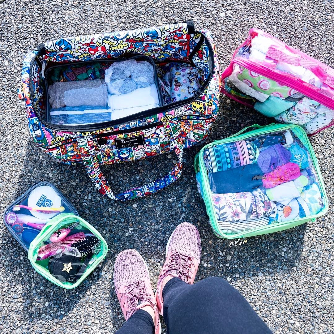 Diaper bag organized with travel cubes
