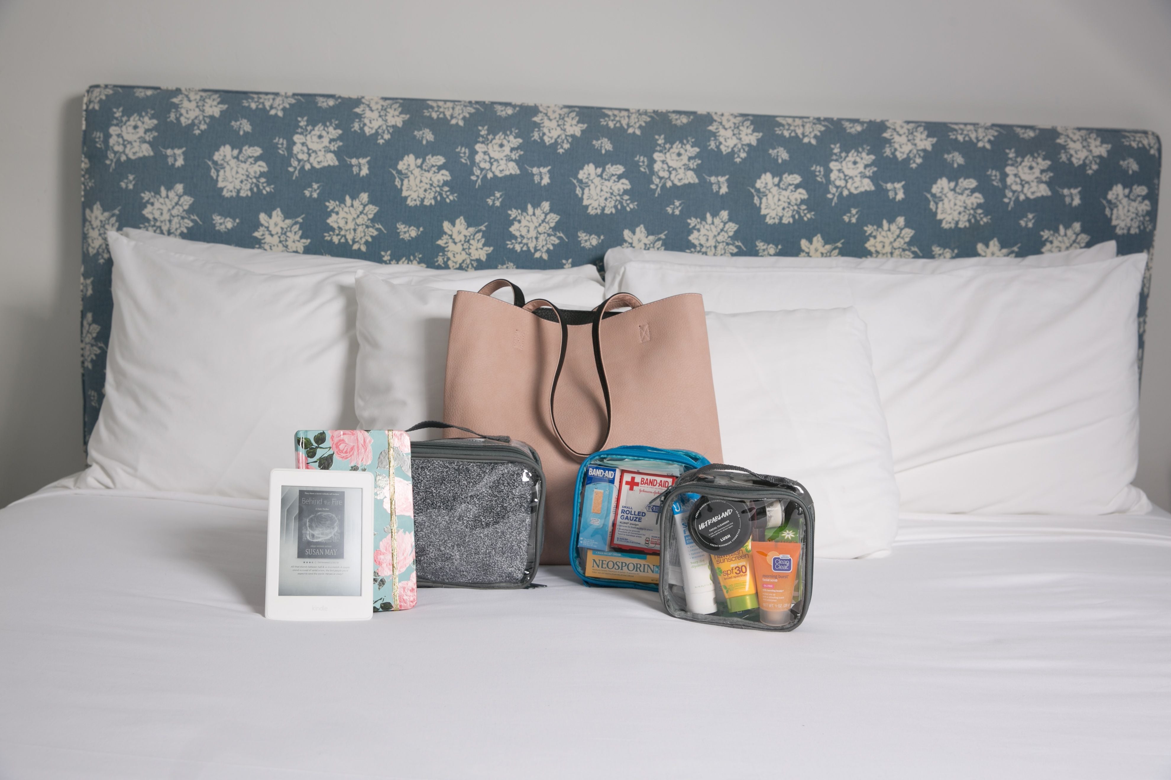 Tote bag and overnight trip essentials in clear packing cubes