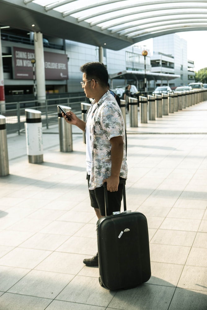 Man with suitcase on airport