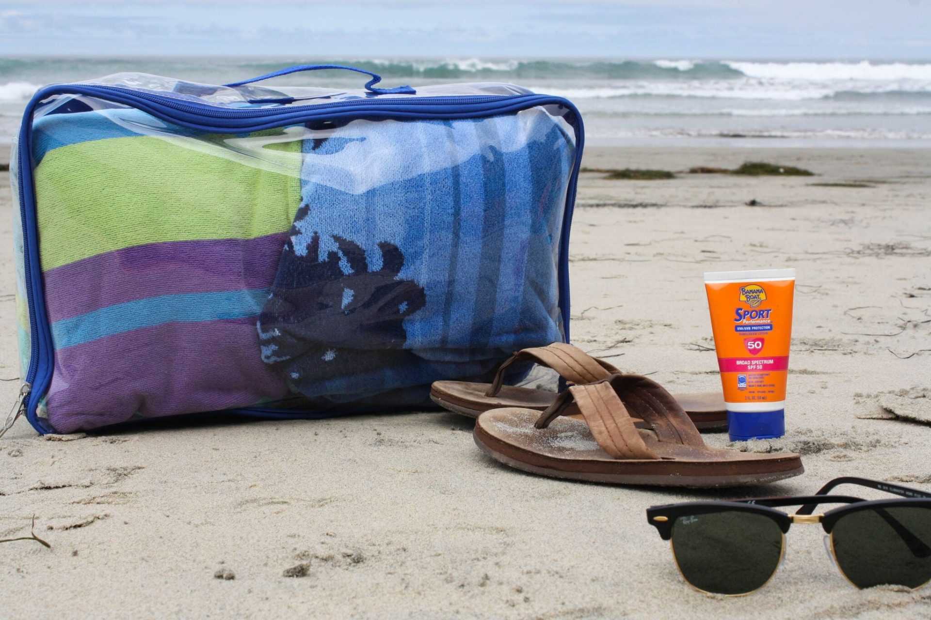 Blue large packing cube as a beach tote bag