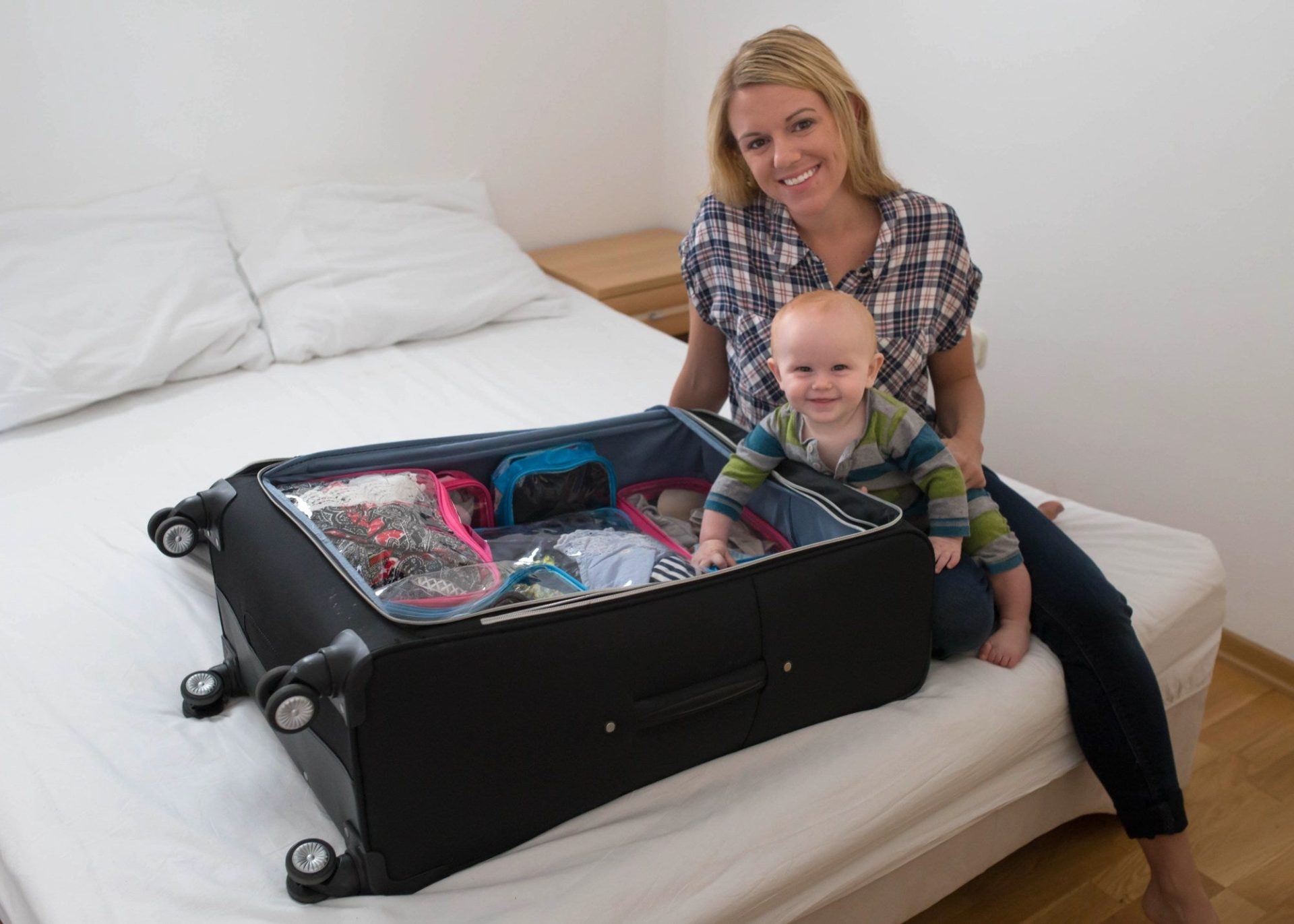 Mommy and baby packing for a trip