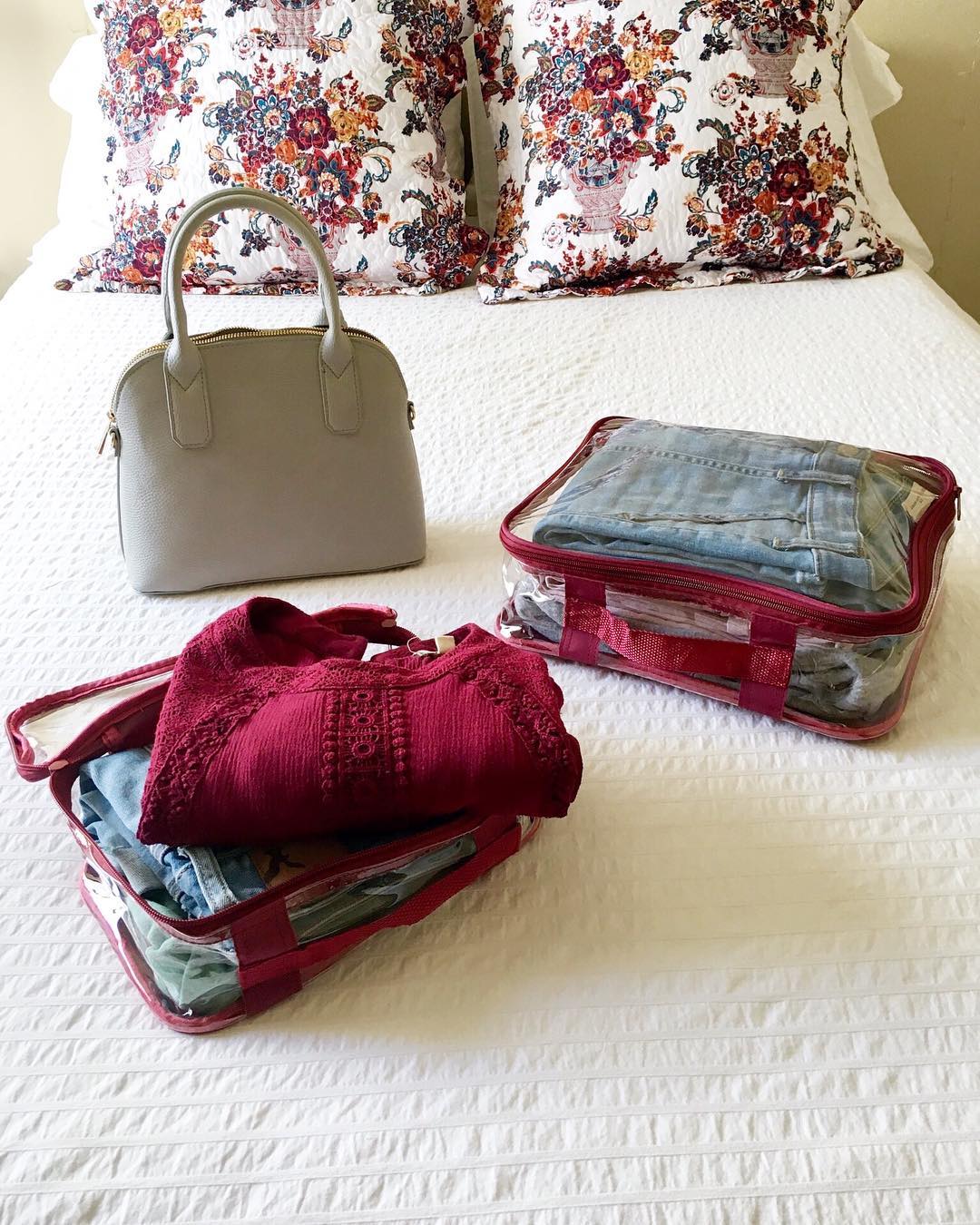 Clothes packed in burgundy cubes