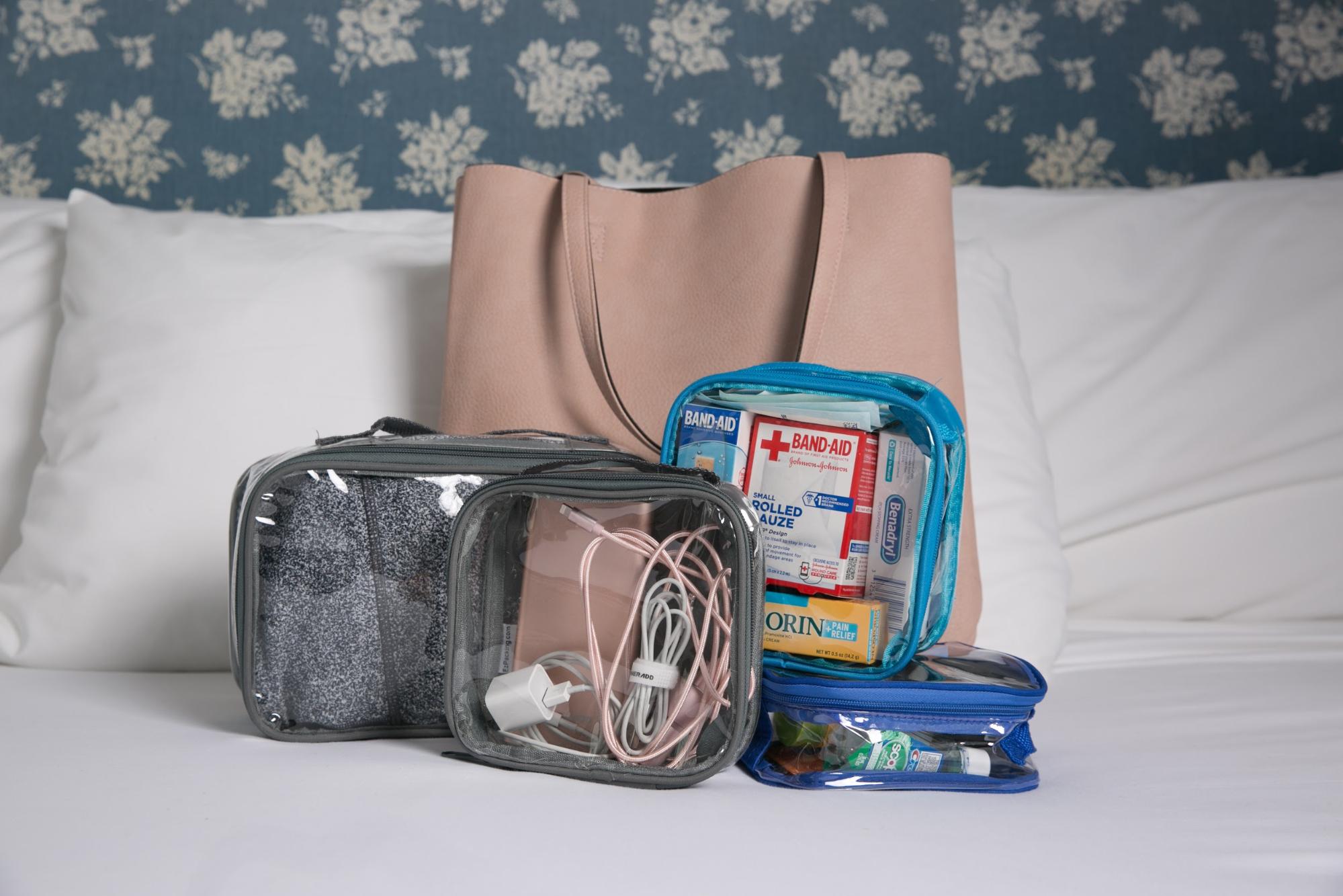 Place all your in-flight essentials inside clear packing cubes 