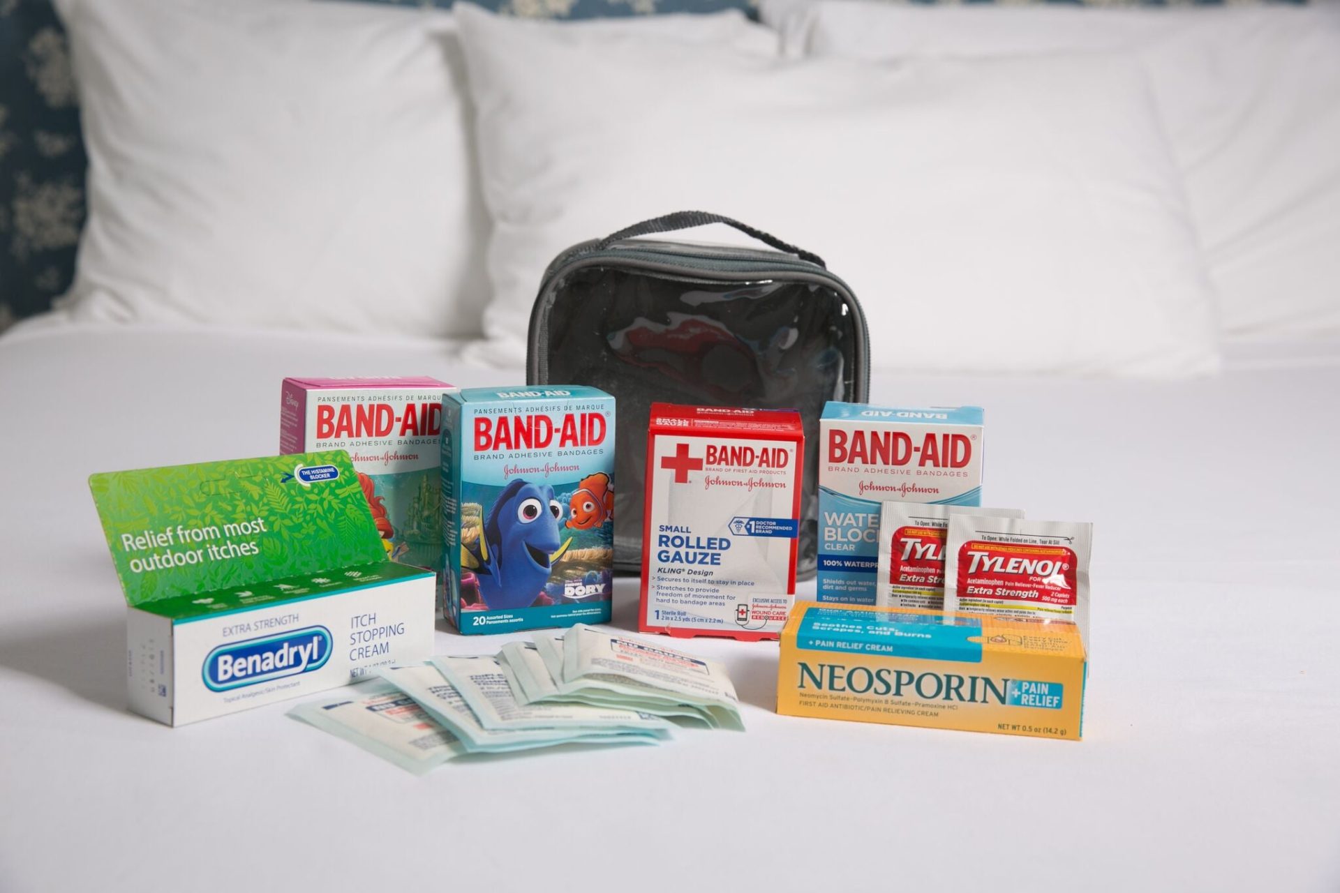 Medications and first aid essentials for what to pack in a carry on