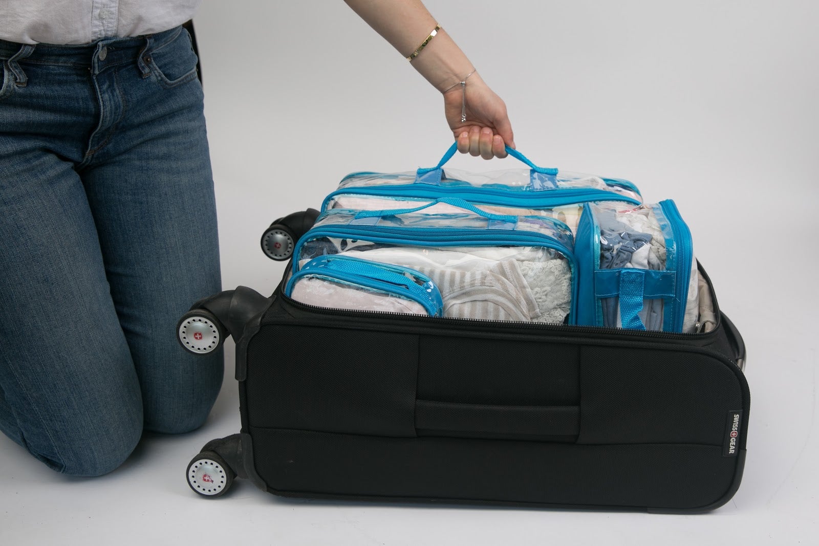 Turquoise packing cubes best system for carry on luggage