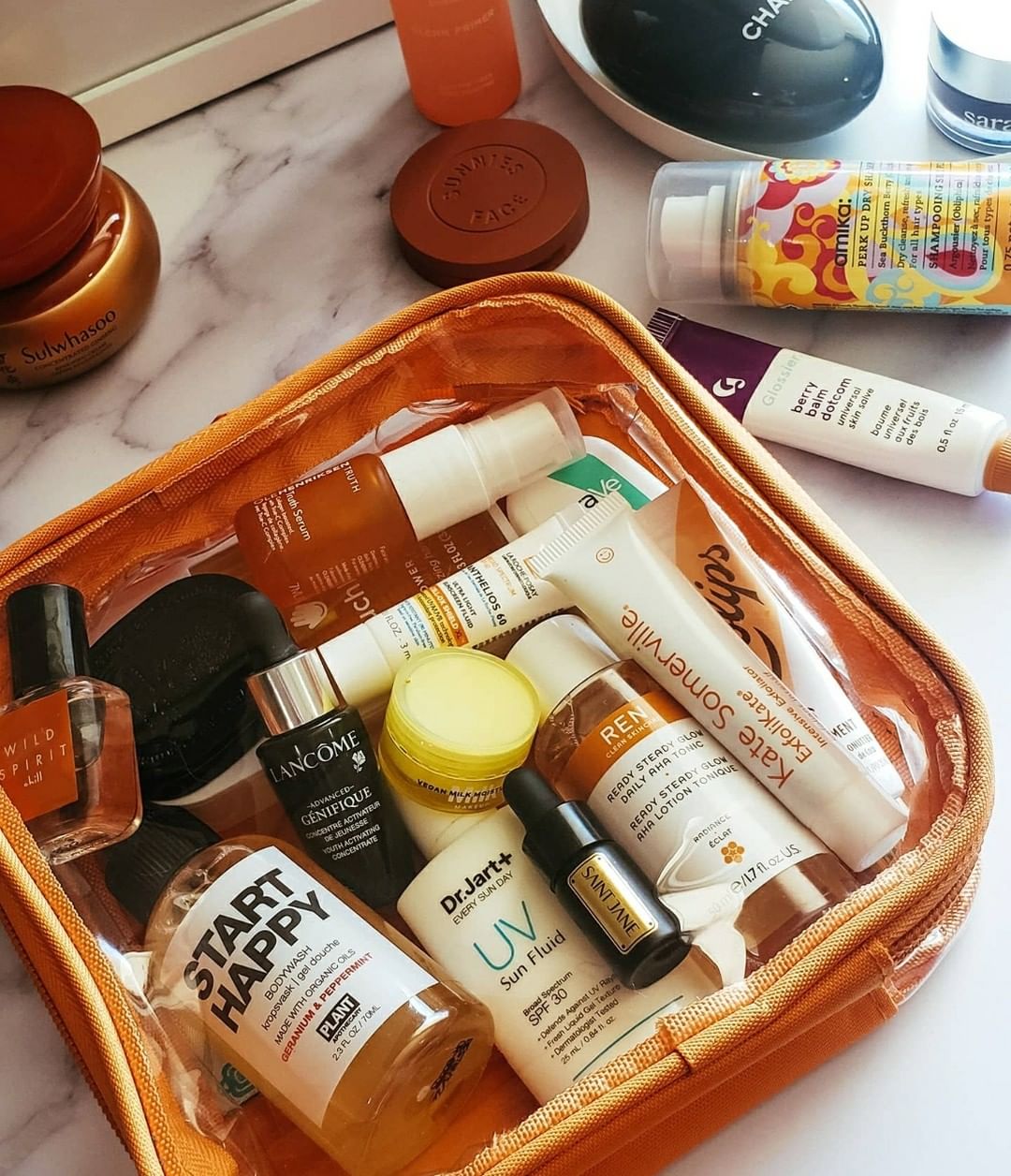 toiletries in an orange extra small cube
