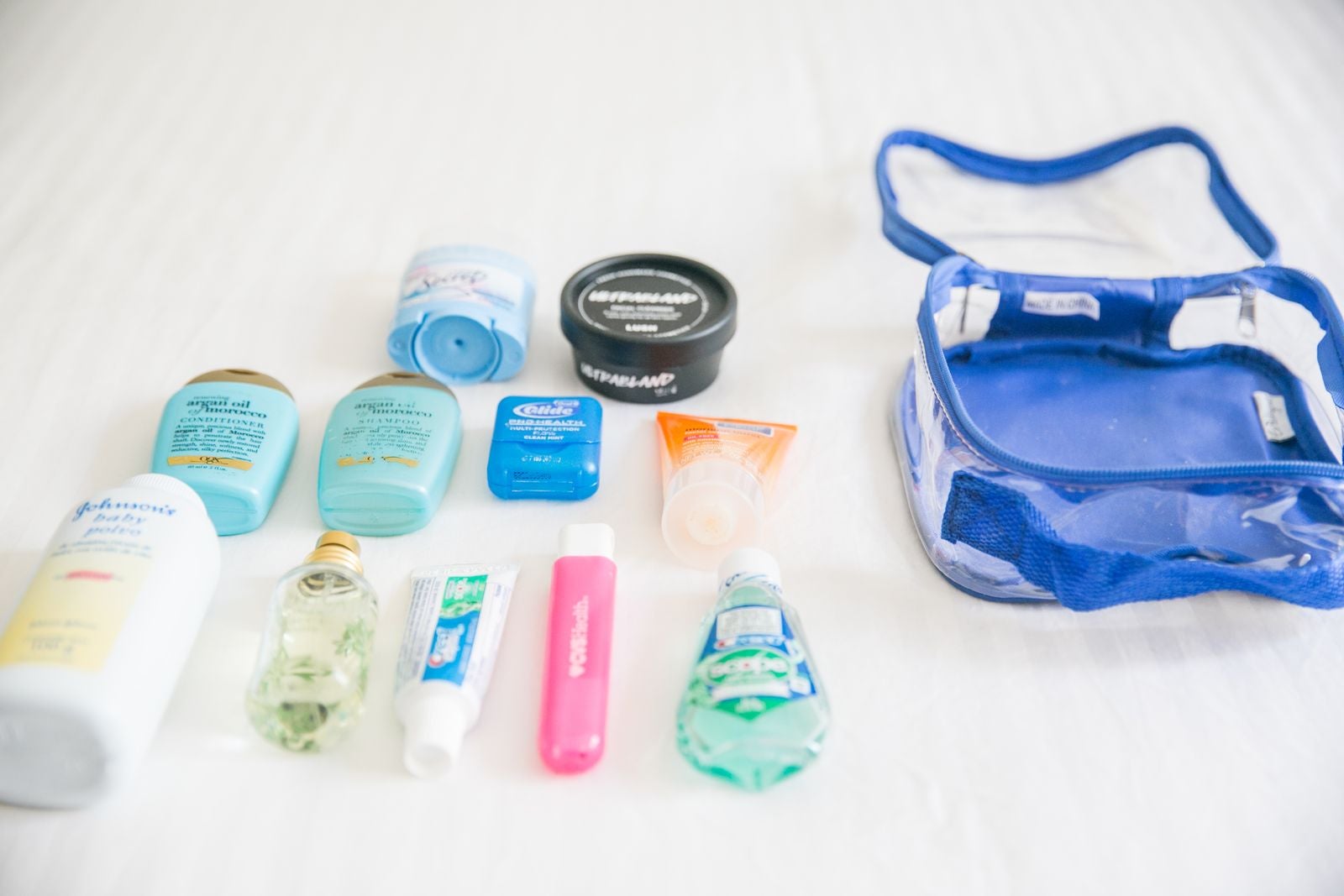 toiletries in a royal blue extra small cube