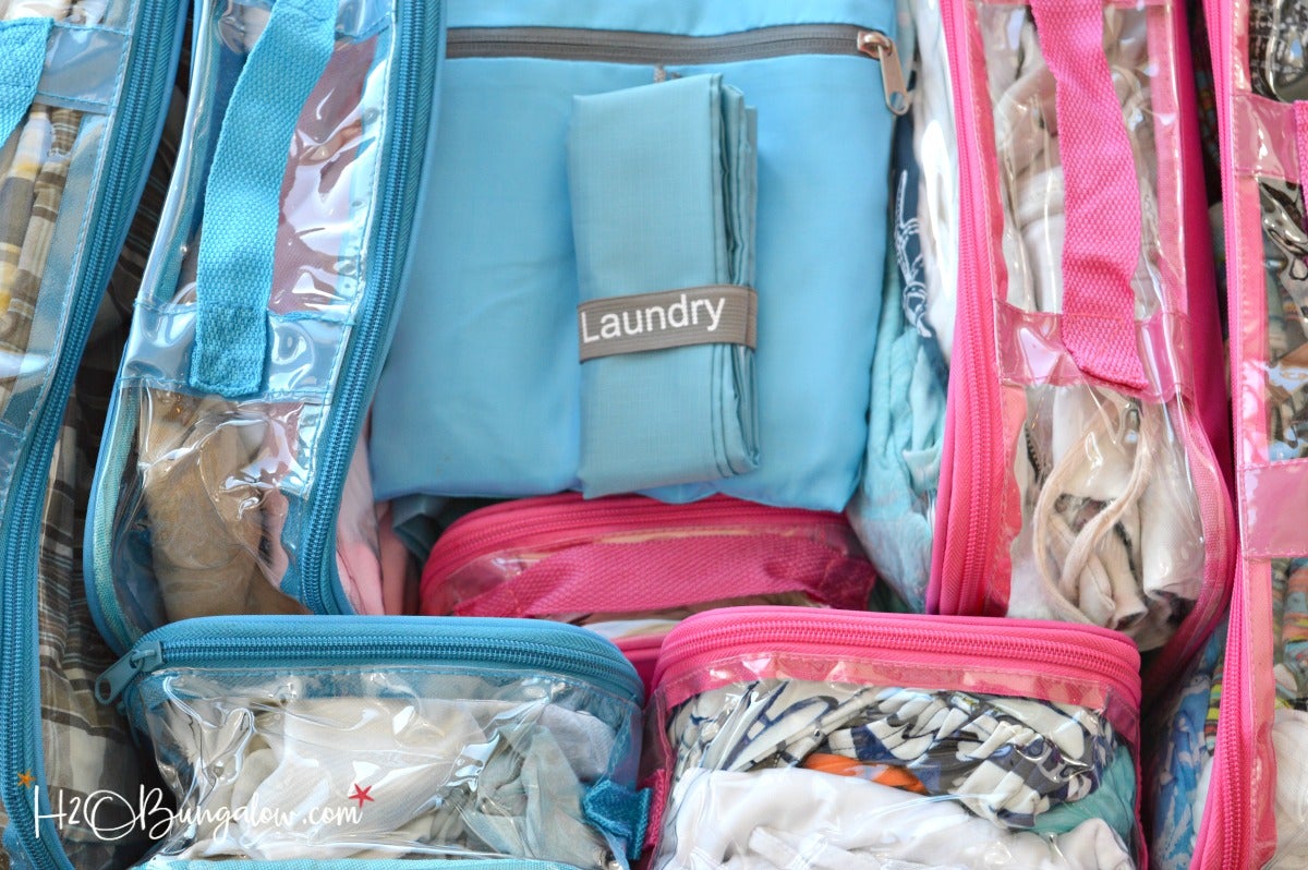 Travel laundry bag with clear packing cubes