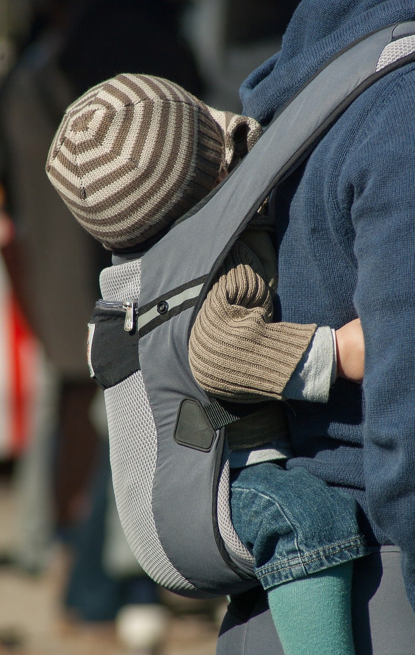 Mom carrying lap baby using carrier