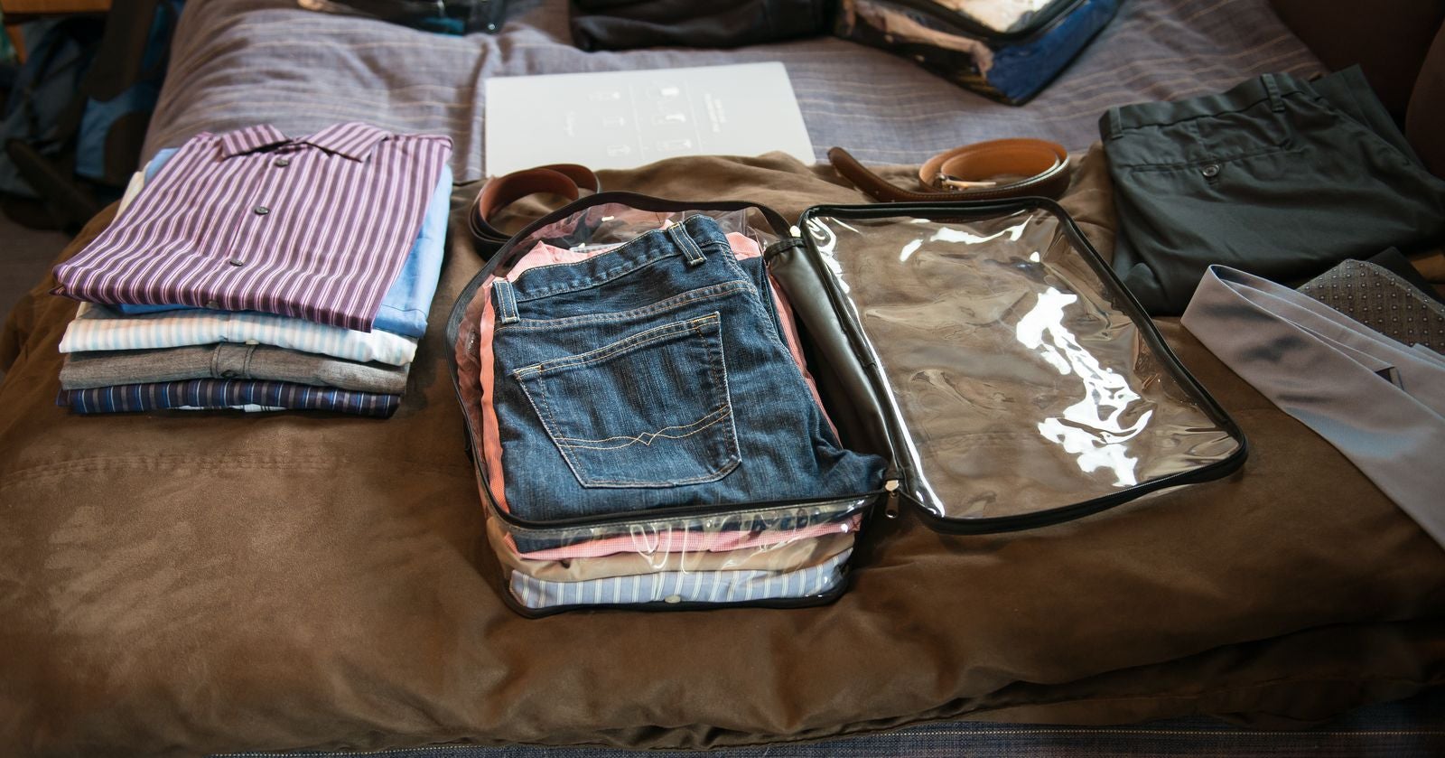 dad's clothes packed in a black medium cube
