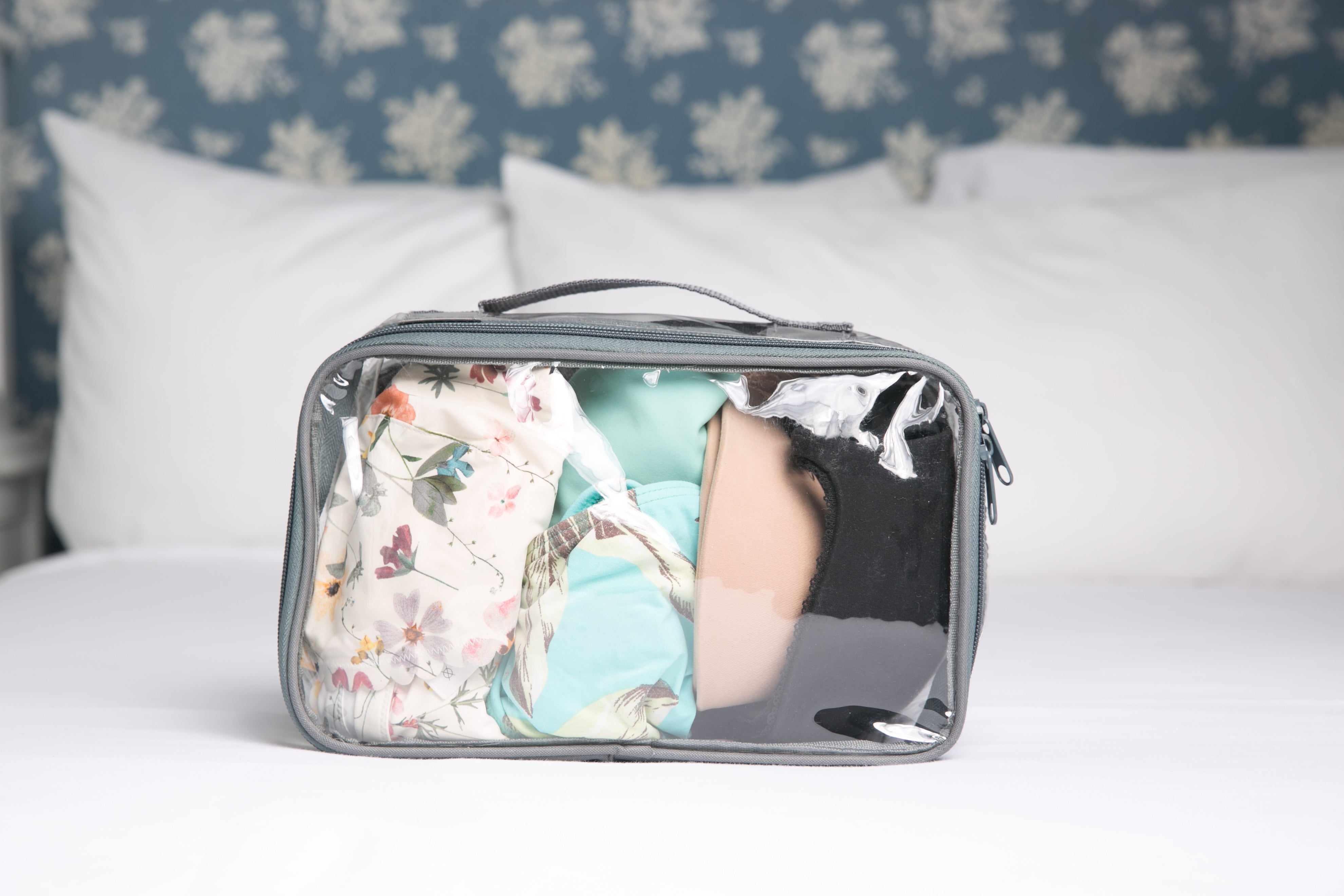 Clear packing cube with underwear and swimwear inside