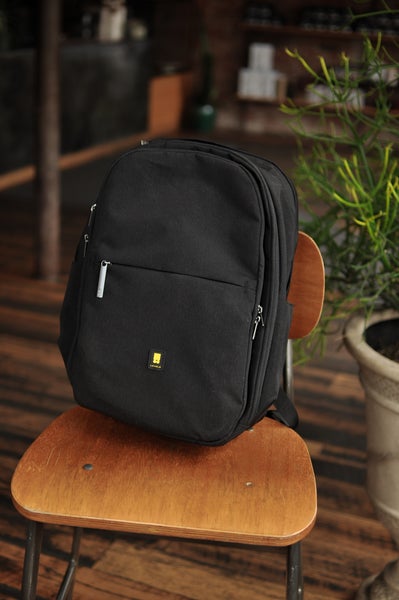 Atlas pro laptop backpack on the chair