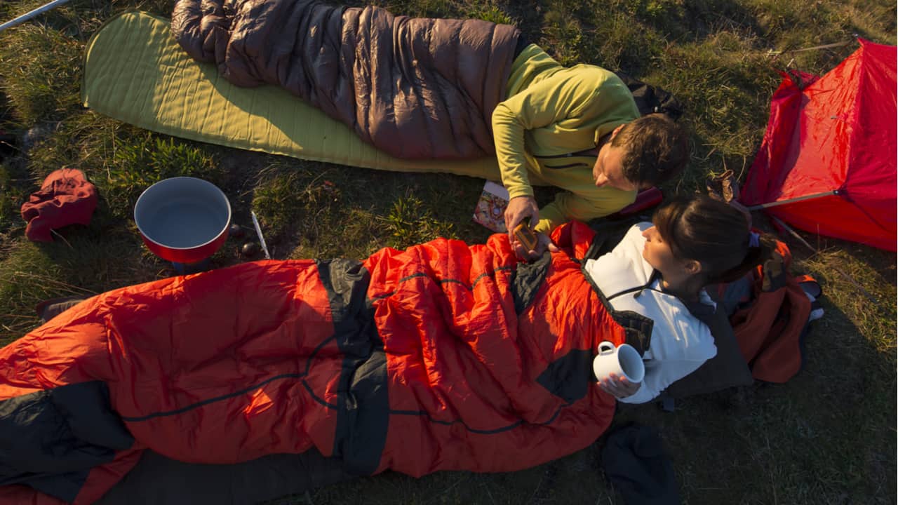 Backpackers using sleeping bags
