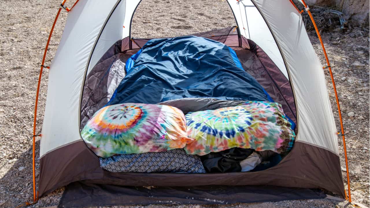 Double sleeping bag in a tent