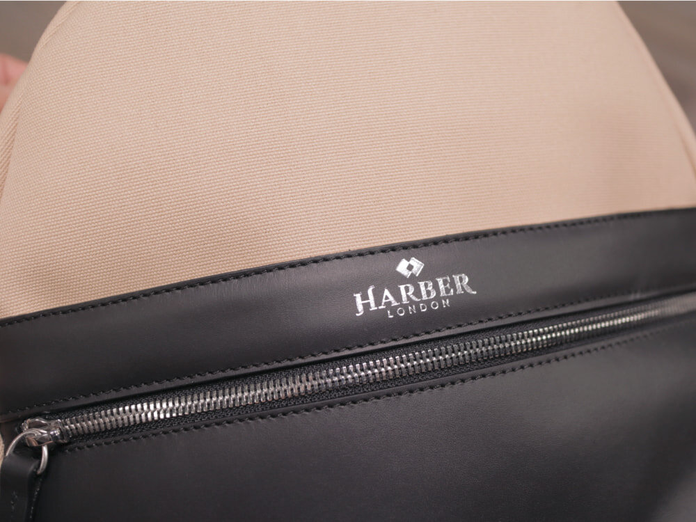 Full grain leather and chrome zippers on the Harber London Office Backpack