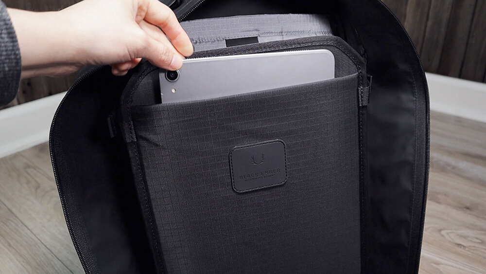 The tablet sleeve can be found on the compression divider.