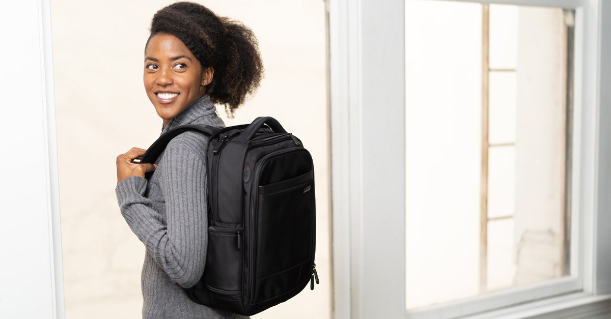 Woman wearing a Junyuan laptop backpack 