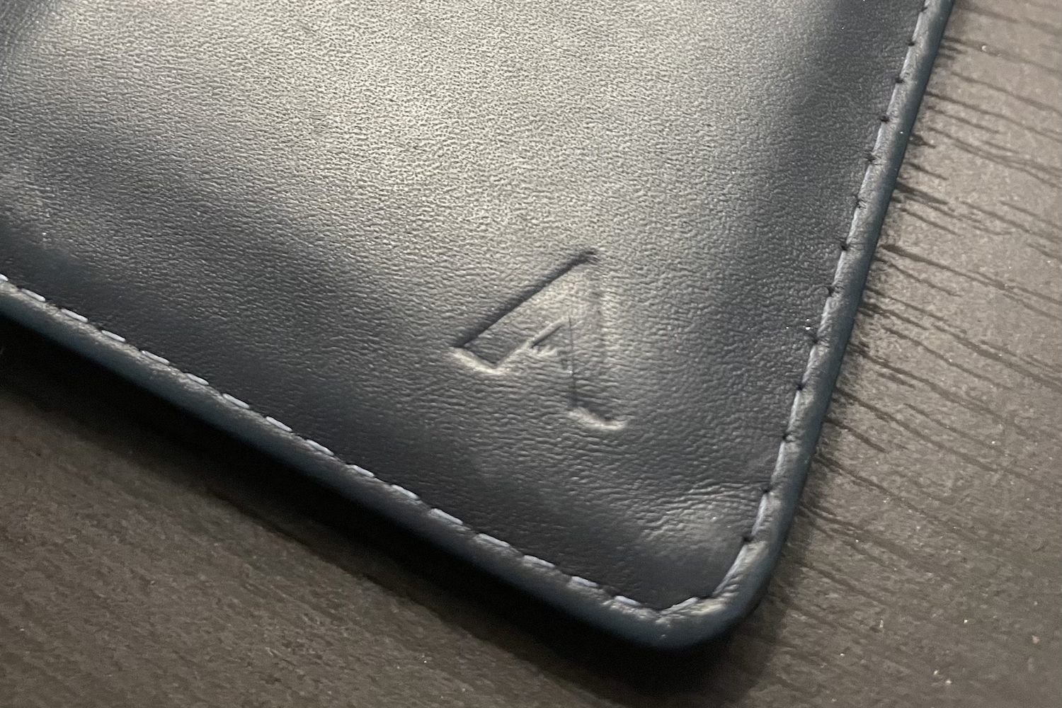 Patina on the Allett midnight blue Nappa leather Hybrid Card Wallet