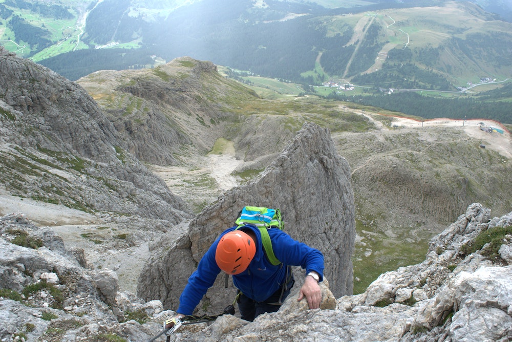 A person climbing the mountain