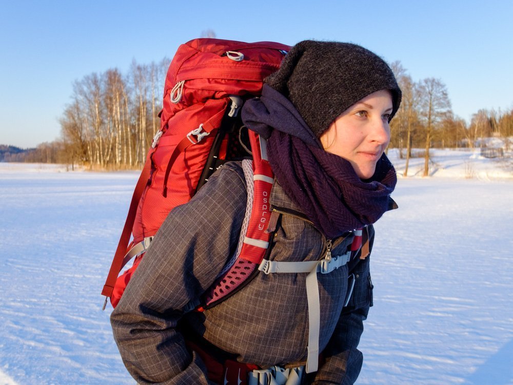 Woman wearing Osprey Aura AG 65 backpack