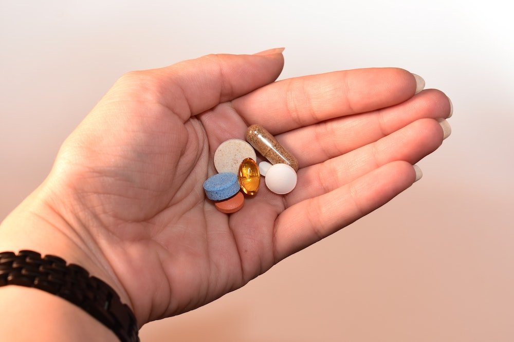 Pills in a person's hand