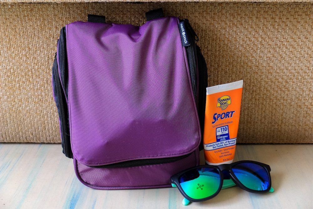 Neatpack toiletry bag and sunscreen