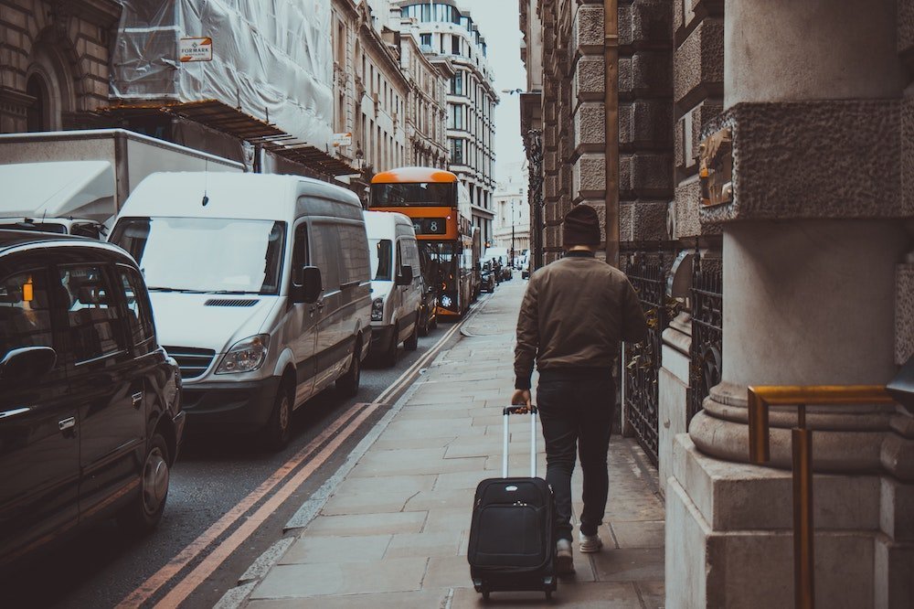 A traveler with a suitcase