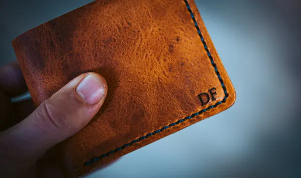Traditional English Tan leather wallet personalized with the initial ‘DF”