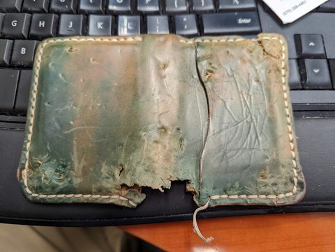 Shell Cordovan wallet chewed on by a dog (yikes!)