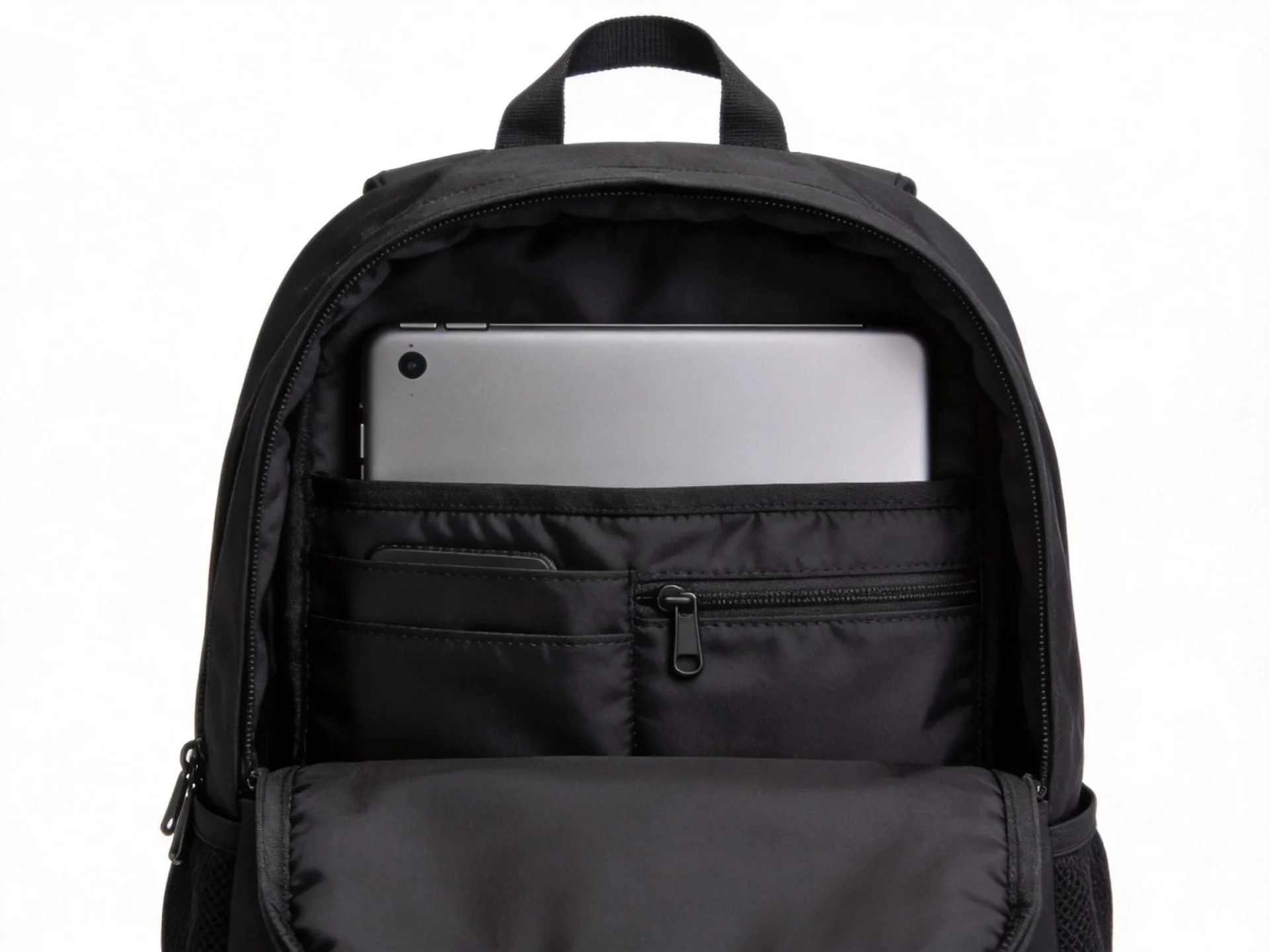 AmazonBasics laptop backpack open showing organized interior compartments