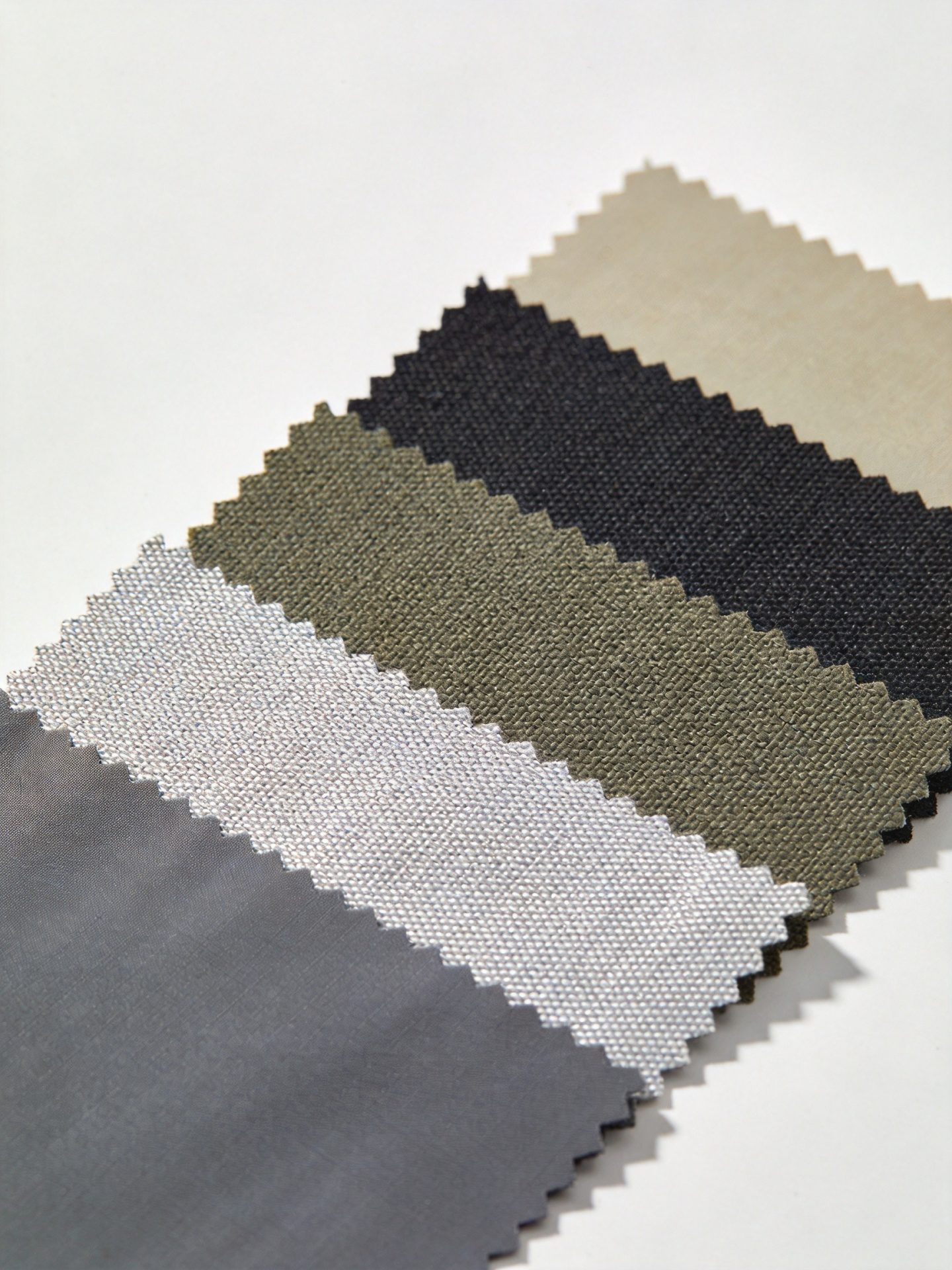 Backpack fabric materials comparison including nylon polyester and canvas
