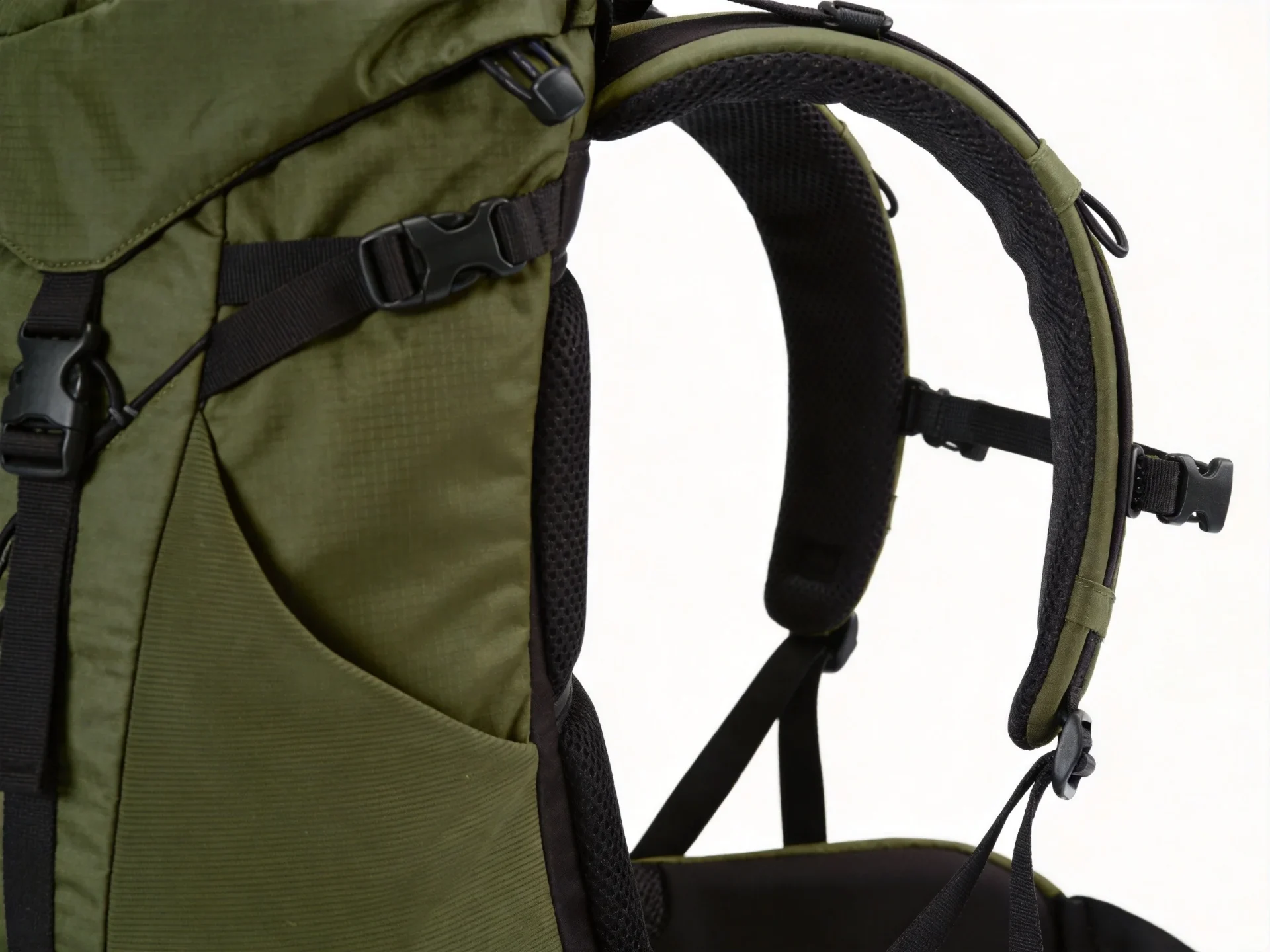 Osprey style hiking backpack with breathable mesh back panel in forest green