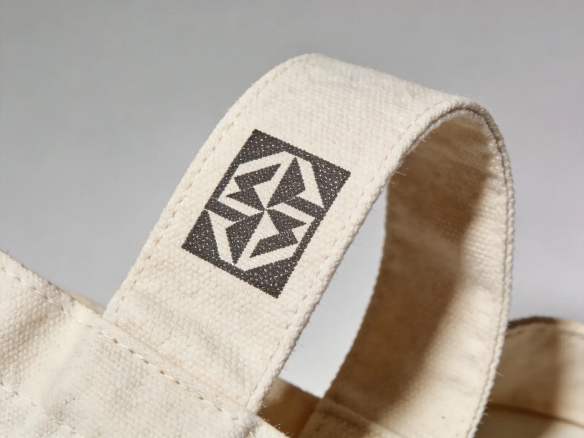 custom printed canvas tote bag with screen printed logo detail