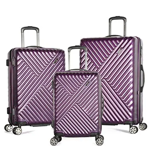 A set of hard-shell polycarbonate spinner suitcases in carry-on and larger sizes with four spinner wheels, the value-priced hardside style that Delsey Helium builds for budget-conscious travelers