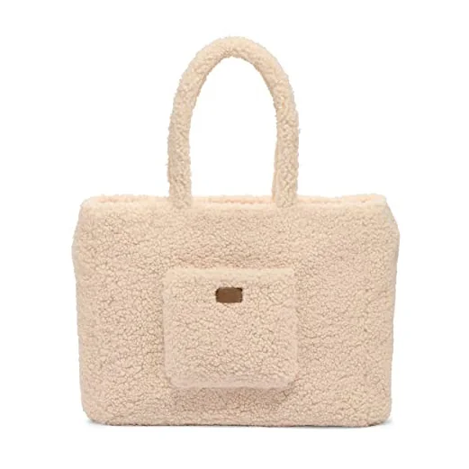 Sherpa tote bag front view showing the applied front pocket and leather label position